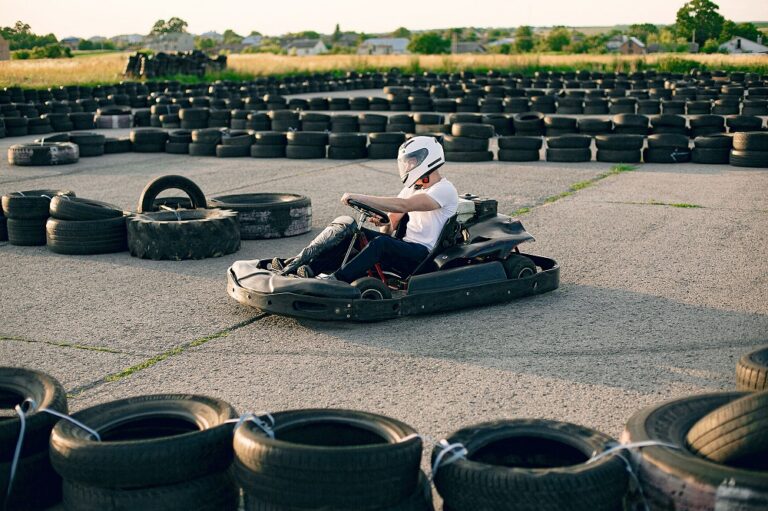 handsome man in a karting with a car